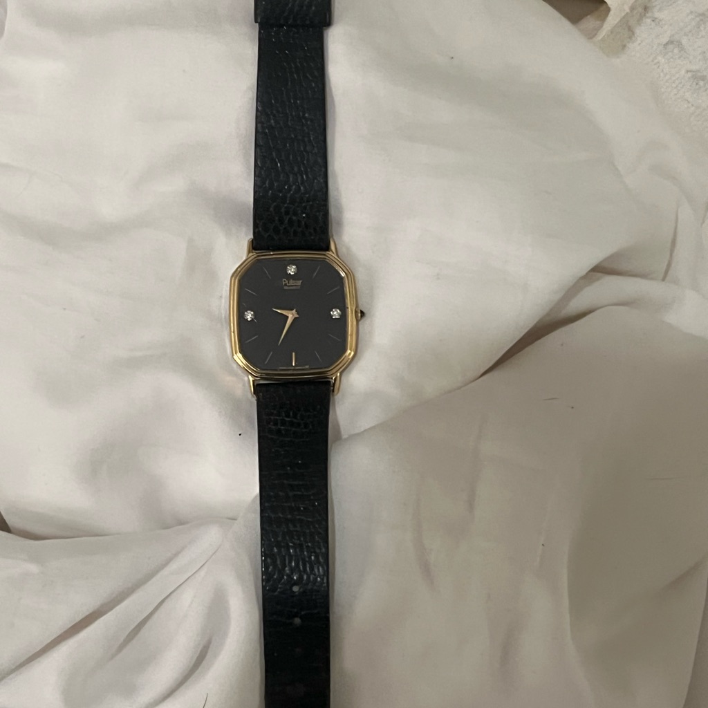 Black Leather Strap Watch With Gold Accents